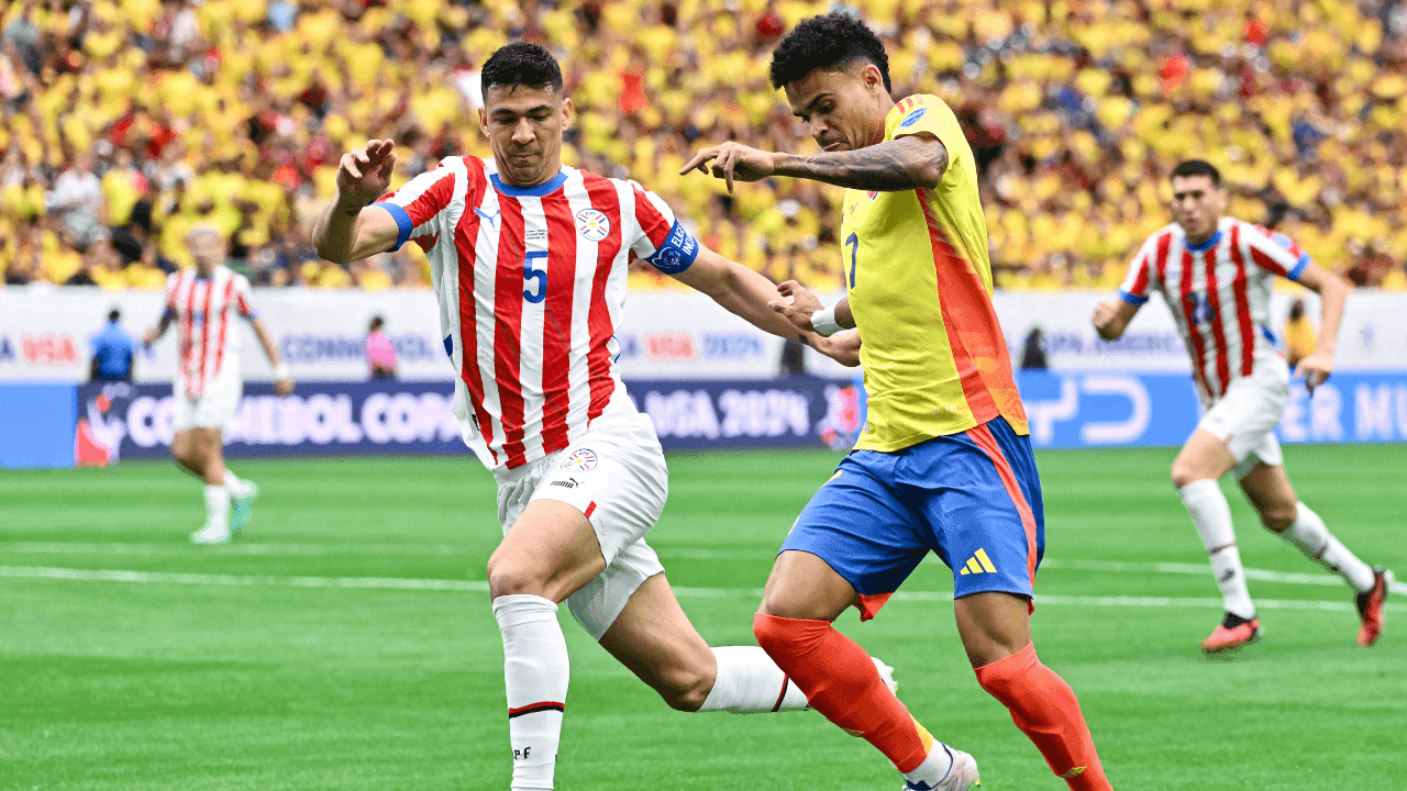 photologuephotos2025-03luis_diaz_regatea_ante_un_defensor_paraguayo_en_la_copa_america_2024png photologuephotos2025-03luis_diaz_regatea_ante_un_defensor_paraguayo_en_la_copa_america_2024png